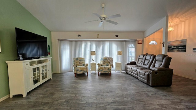 living room featuring ceiling fan, dark wood-type flooring, and vaulted ceiling