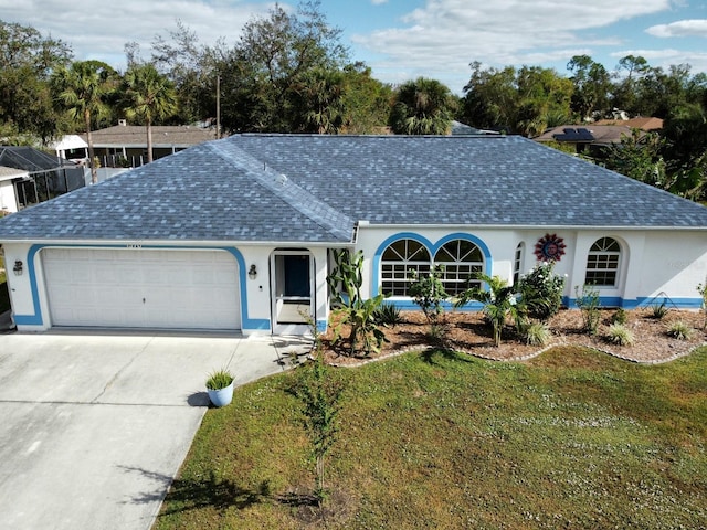 ranch-style house with a garage and a front yard