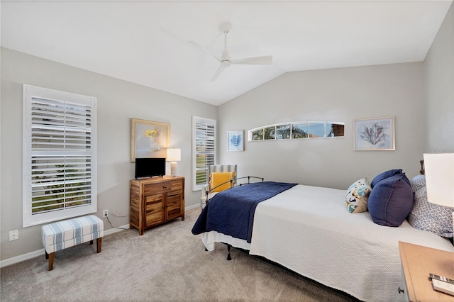 carpeted bedroom featuring ceiling fan and lofted ceiling