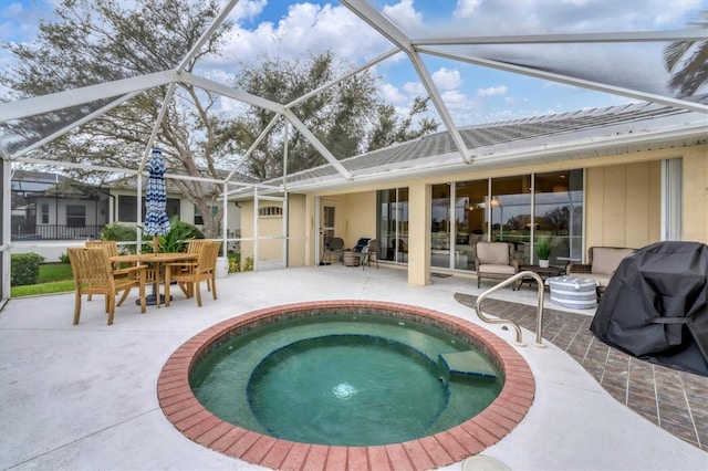 view of swimming pool featuring a lanai, a patio area, an outdoor hangout area, and a jacuzzi