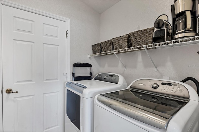 laundry room featuring independent washer and dryer