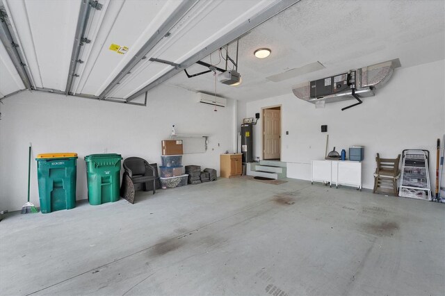 garage with electric water heater and a garage door opener