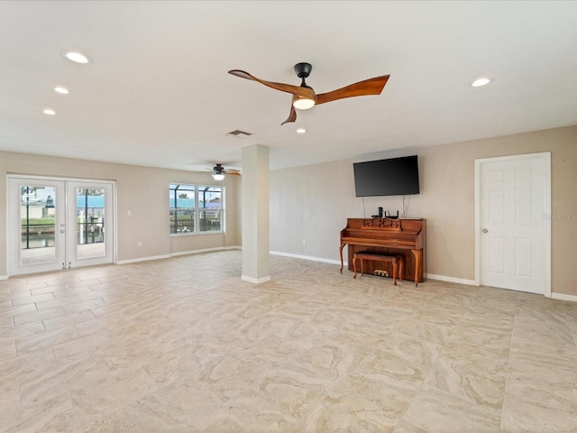 unfurnished living room featuring ceiling fan