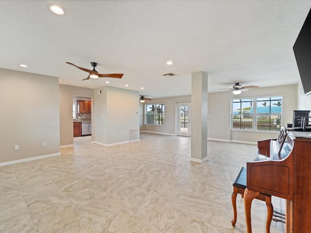 living room with a textured ceiling