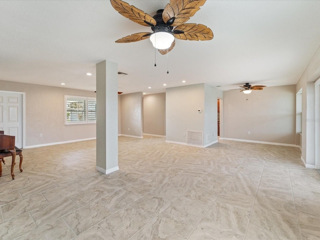 unfurnished living room featuring ceiling fan