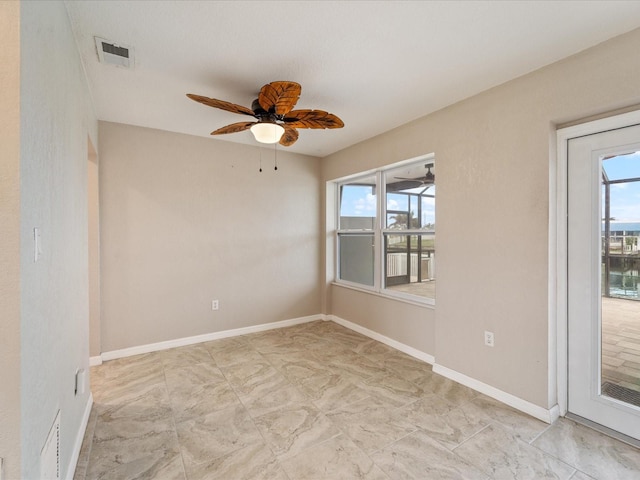 unfurnished room with ceiling fan