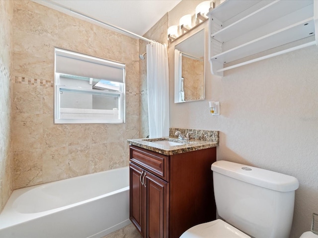 full bathroom with vanity, toilet, and shower / tub combo with curtain