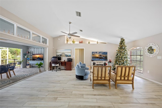 interior space with high vaulted ceiling, light hardwood / wood-style flooring, and ceiling fan