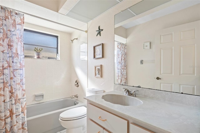 full bathroom with vanity, shower / bath combination with curtain, and toilet