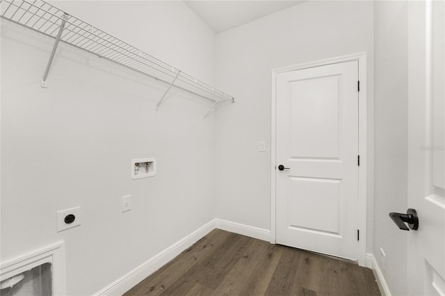 clothes washing area with dark wood-type flooring, hookup for a washing machine, and electric dryer hookup