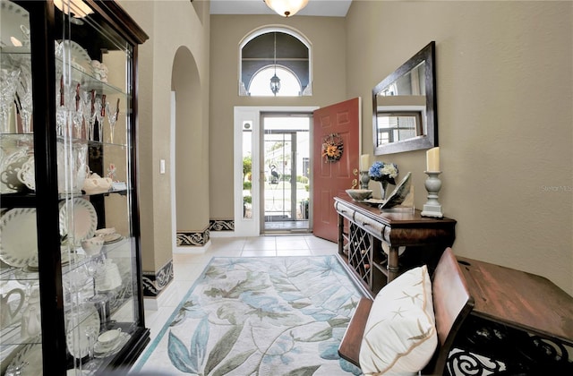 entryway featuring light tile patterned floors