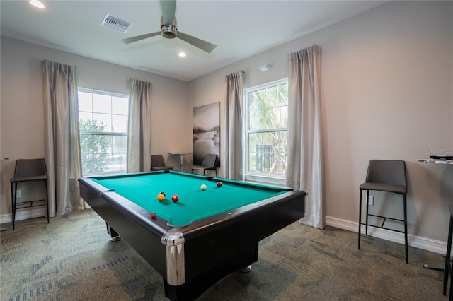 recreation room featuring dark colored carpet, plenty of natural light, ceiling fan, and pool table