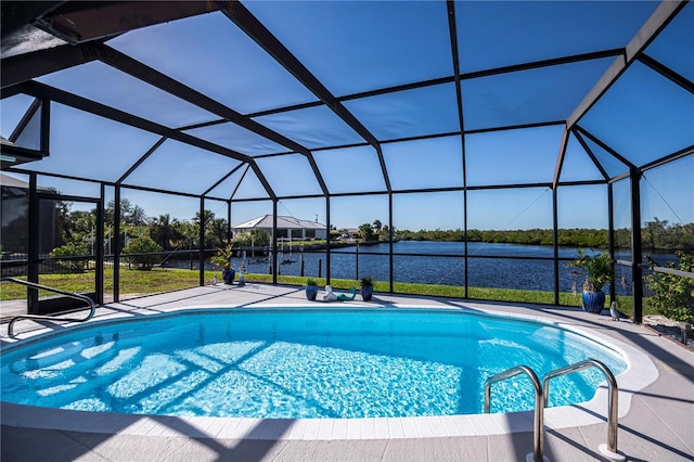 view of pool featuring a lanai, a water view, and a patio