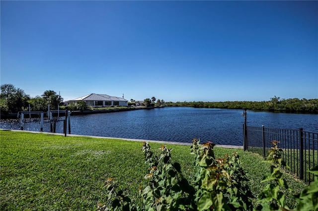 view of water feature with a dock