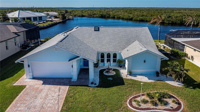 drone / aerial view with a water view