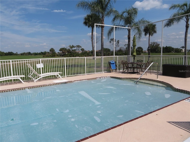 1360 Rio De Janeiro Ave Unit 117, Punta Gorda, FL 33983 - community pool with a patio