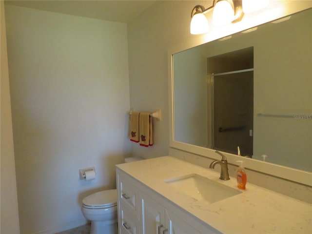 1360 Rio De Janeiro Ave Unit 117, Punta Gorda, FL 33983 - bathroom with toilet, vanity, and a shower stall