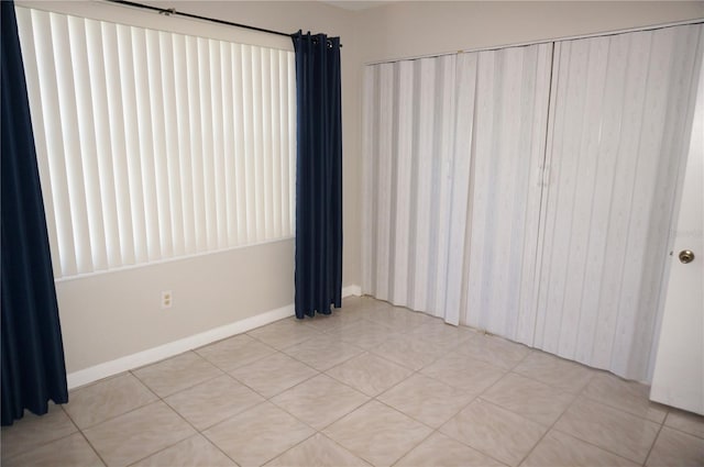 view of tiled spare room