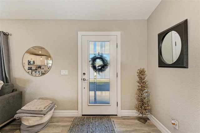 foyer featuring hardwood / wood-style flooring