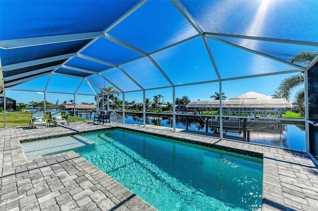 view of swimming pool featuring a lanai, a boat dock, a water view, and a patio