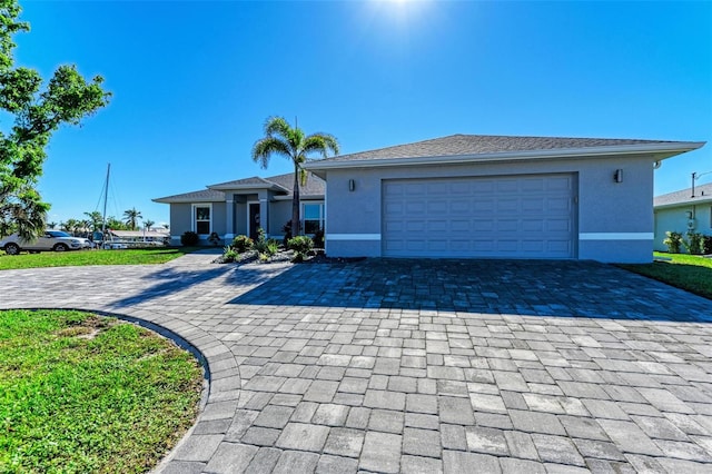 single story home with a garage