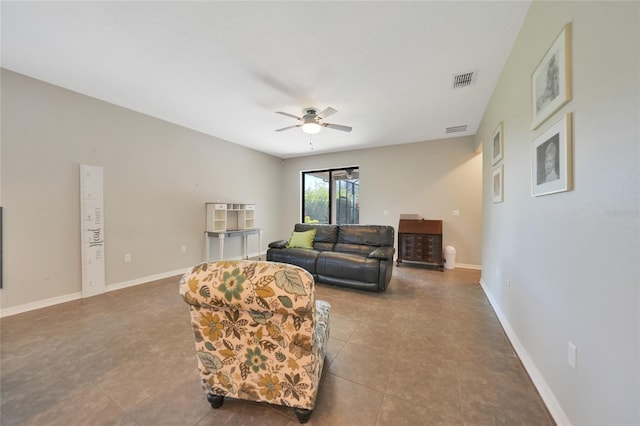 tiled living room with ceiling fan