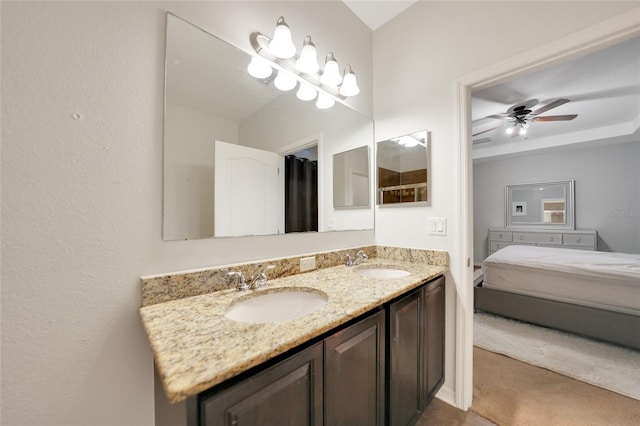 bathroom featuring vanity and ceiling fan