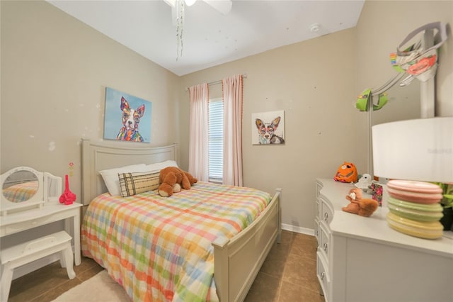 tiled bedroom with ceiling fan