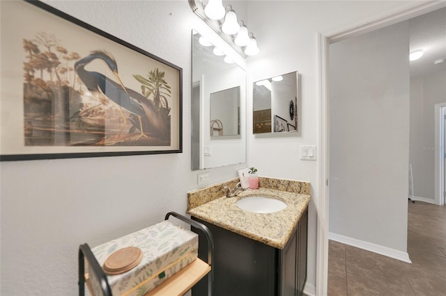 bathroom with vanity and tile patterned floors