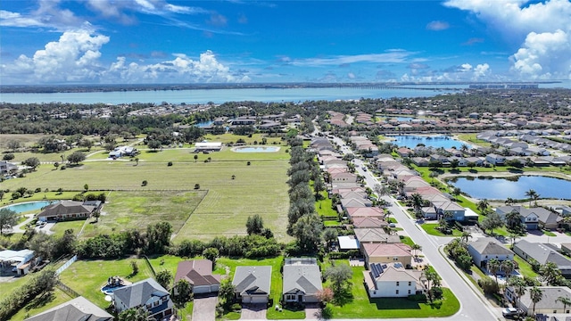 drone / aerial view with a water view