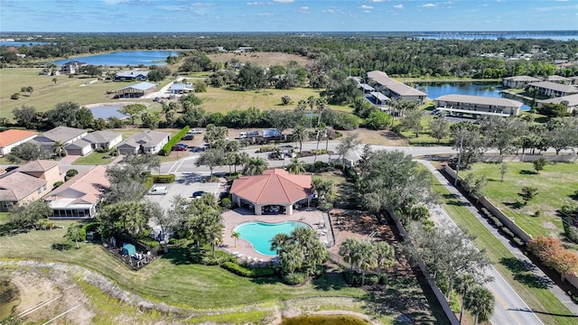 drone / aerial view with a water view