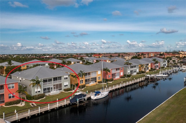 drone / aerial view with a water view