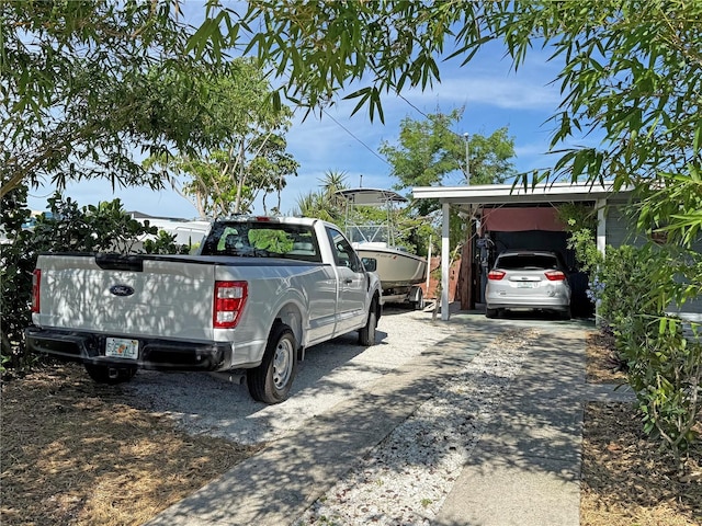 107 Dunn Dr NE, Port Charlotte, FL 33952 - view of parking / parking lot with driveway