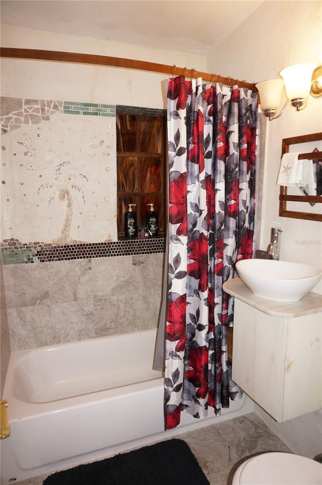 107 Dunn Dr NE, Port Charlotte, FL 33952 - bathroom featuring shower / bath combo with shower curtain, vanity, and toilet