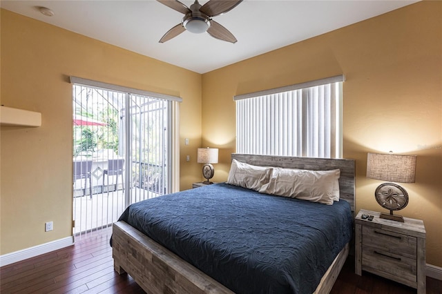 bedroom with dark wood-type flooring, access to outside, and ceiling fan