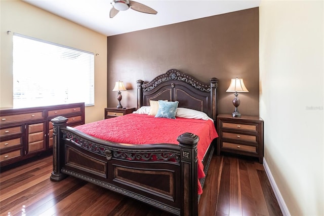 bedroom with dark wood-type flooring and ceiling fan