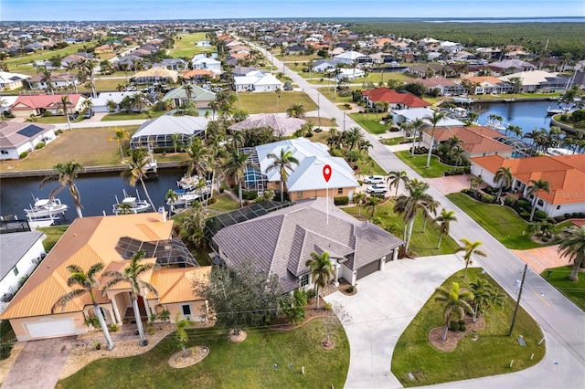 drone / aerial view with a water view