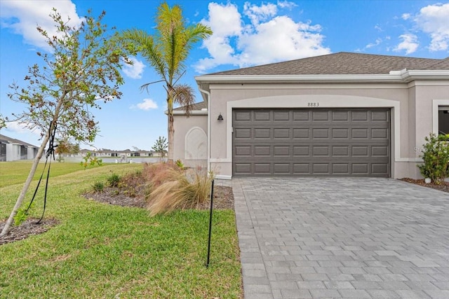 garage with a yard