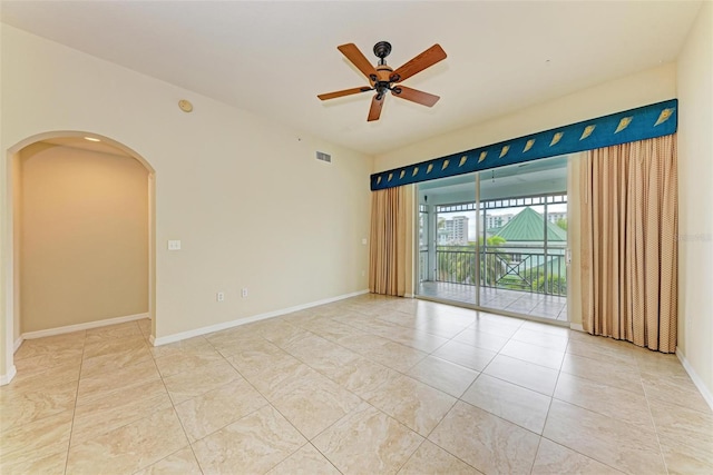 empty room featuring ceiling fan