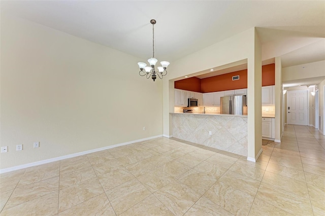 interior space featuring an inviting chandelier