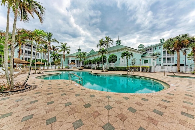 view of pool featuring a patio