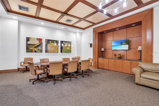 carpeted dining space featuring ornamental molding and coffered ceiling