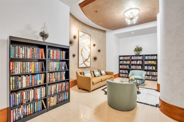 living area with tile patterned floors