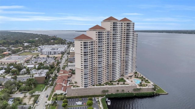 birds eye view of property with a water view