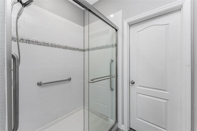 bathroom featuring walk in shower