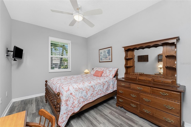 bedroom featuring wood-type flooring and ceiling fan