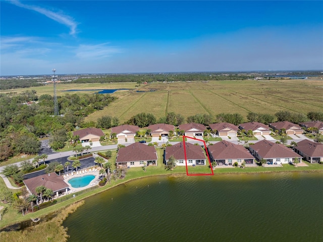 bird's eye view with a water view and a rural view