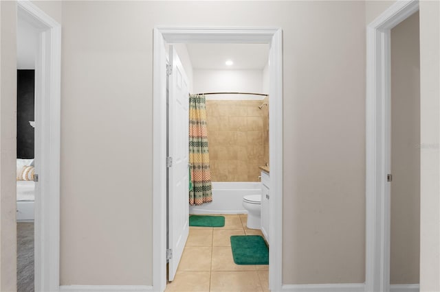 full bathroom with tile patterned flooring, vanity, shower / bath combination with curtain, and toilet