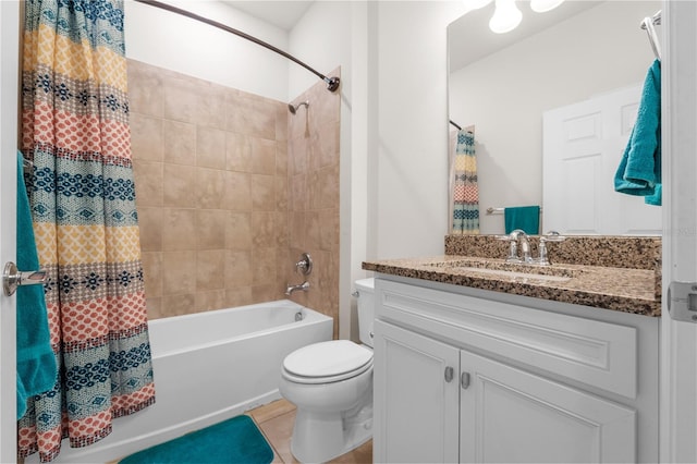 full bathroom featuring tile patterned flooring, shower / tub combo, vanity, and toilet