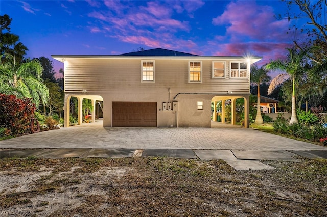 view of front of property with a garage